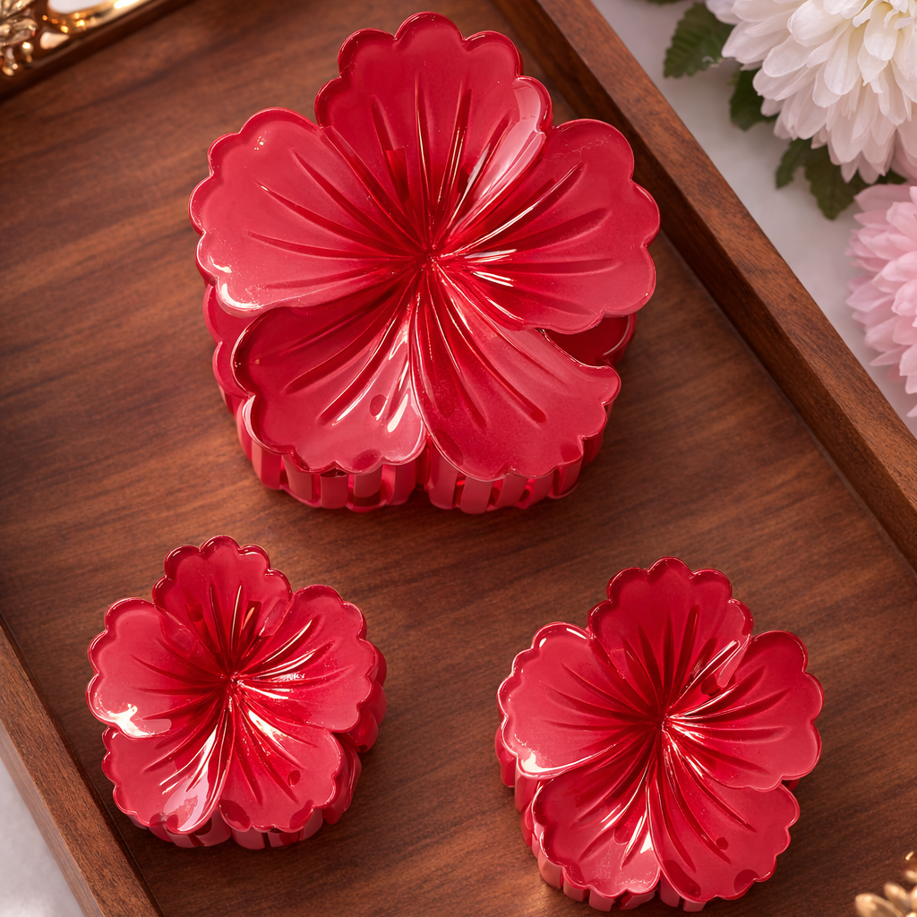 Rose flower-shaped objects on a wooden tray with flowers in the background