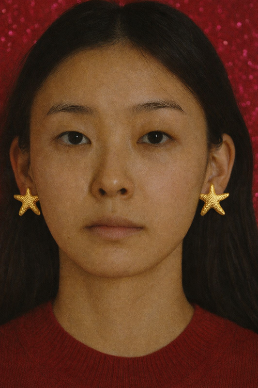 Gold starfish earrings