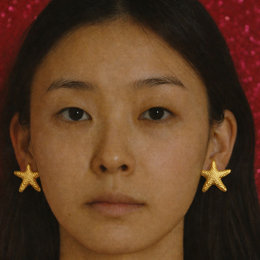Gold starfish earrings