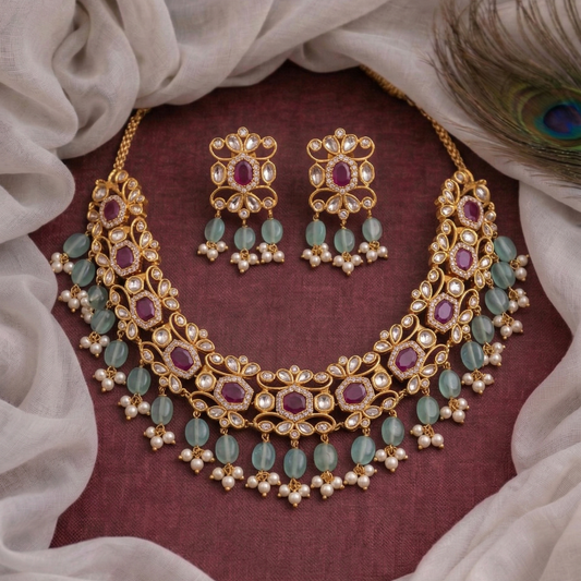 Jewelry set with necklace and earrings on a fabric background